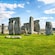 The ancient standing stones of Stonehenge on the grassy Salisbury Plain in southwest England